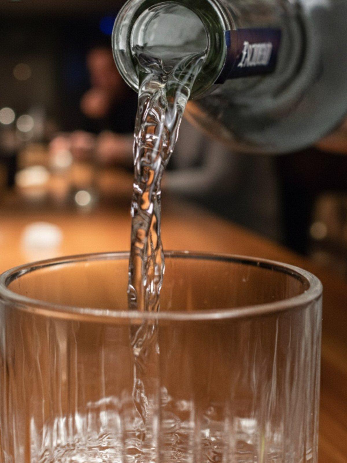 Tequila Escudero being poured into a glass