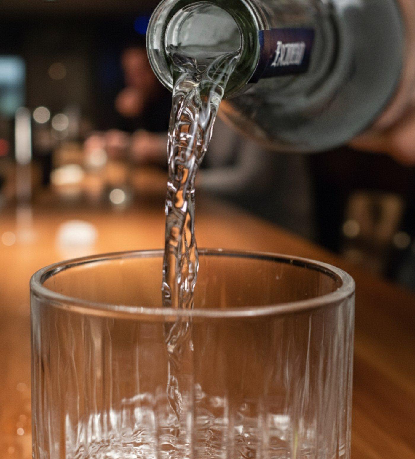 Tequila Escudero being poured from the bottle into a glass
